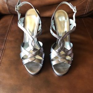 Calvin Klein 6 1/2 metallic silver heel.